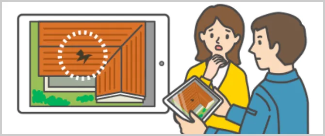 ドローンで撮影した映像をタブレットで確認している様子